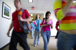 Student rushing in hallway