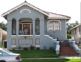 Decorative brick work and side staircase. Elevation about 10 feet.