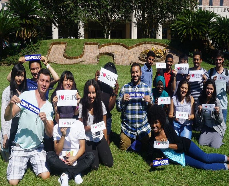 Students in front of old UNO sign