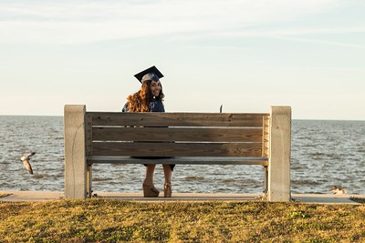 student sitting on bench