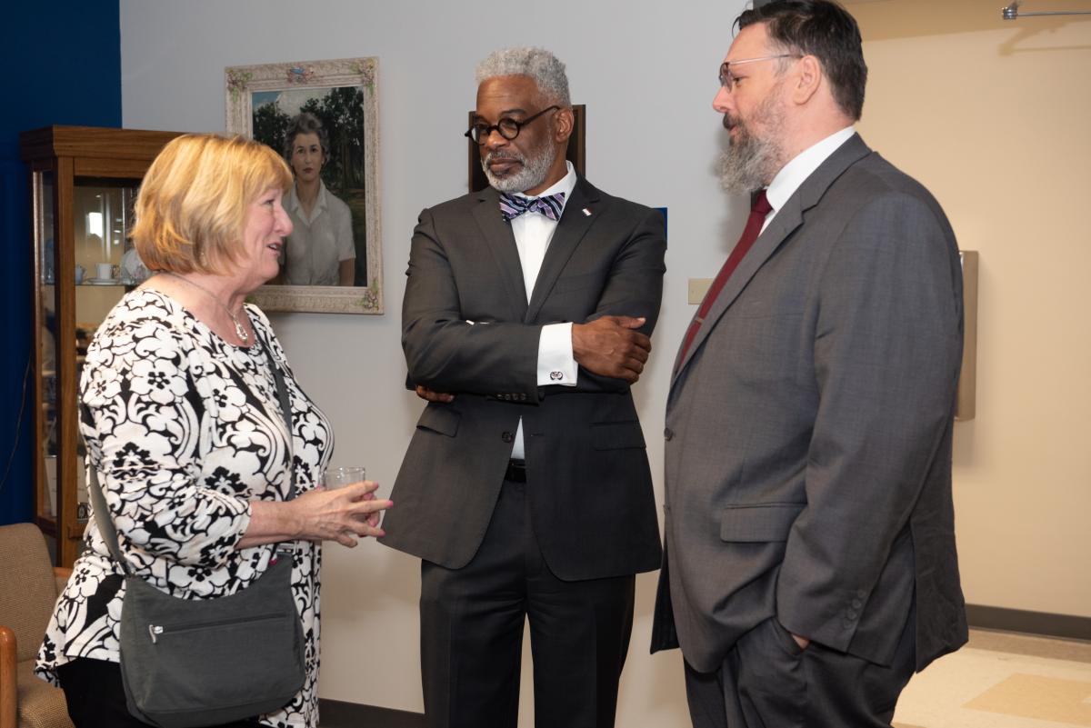 Dean Kim Martin Long chats with community advisors from Court Watch NOLA