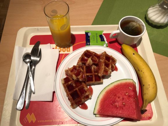 Breakfast option: Belgian waffles with fruit, orange juice and tea.