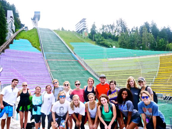 Students posing in front of Olympic Ski Jump in Innsbruck.