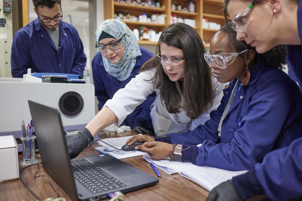 faculty working with students