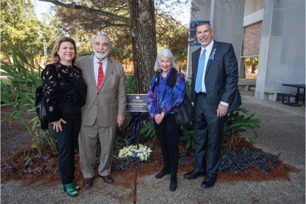 Lissy Amato, John Amato, Virginia Amato and UNO President John Nicklow at the dedication ceremony for the Virginia Rosanne Amato Memorial Patio on the campus of the University of New Orleans. 