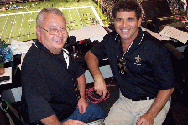 University of New Orleans alumnus Doug Moreau (left) was recently chosen to receive the Joe Gemelli "Fleur de Lis” award for his contributions to the New Orleans Saints organization.