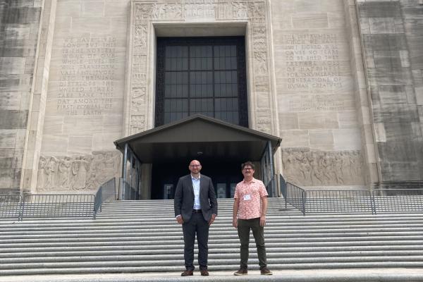 UNO students Jody Billiot and Walker J. Reisman stand in front of the Louisiana Capitol building