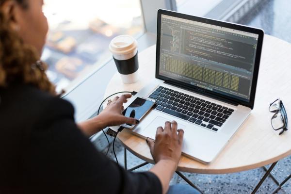 Stock photo of a woman using a laptop computer