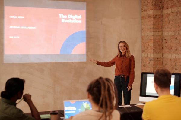 Stock photo of a woman delivering a presentation on digital marketing