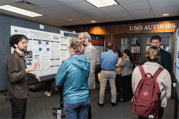 University of New Orleans graduate student Eduardo Turcios shares research as part of the annual InnovateUNO symposium held on campus Nov. 14-15. 