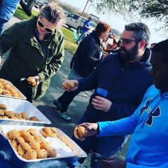 Attendees enjoy food at Homecoming