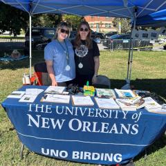 Students behind the UNO Birding table