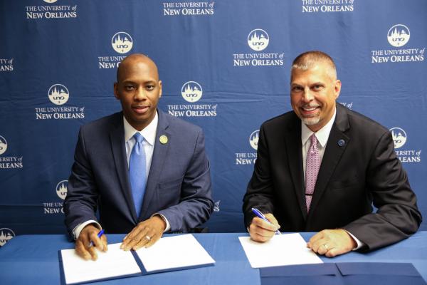 Orleans Parish Schools Superintendent Henderson Lewis (left) and UNO President John Nicklow