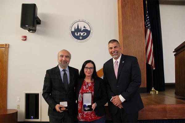 President John Nicklow(far right) with two of the three recipients of the University’s annual awards, (l-r)Parviz Rastgoufard  and Karen Thomas. Margaret Davidson is not pictured.