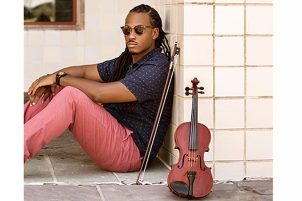 University of New Orleans alumnus Trenton “T-Ray” Thomas is charting a music career with a love of the violin and an outside-the-box playlist. 