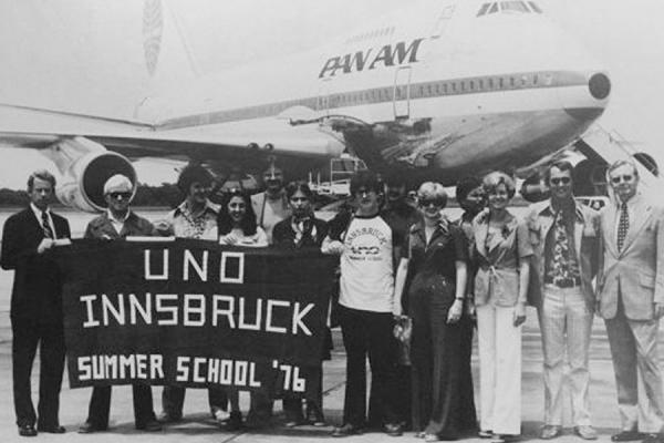 Students, faculty and administrators pose for a picture in 1976 before boarding the airplane for that inaugural summer session in Innsbruck, Austria.