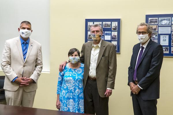 President John Nicklow, donors Judith Russell and Michael Russell, and College of Sciences Dean Steve Johnson.