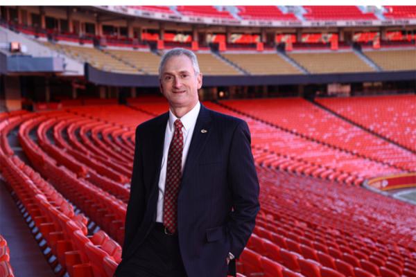 University of New Orleans alumnus Dan Crumb, CFO for the Kansas City Chiefs, stands in Arrowhead Stadium.