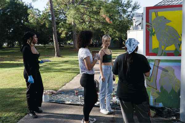 University of New Orleans fine art students are painting murals on campus and raising awareness to the impact that climate change has on the local bird population. 