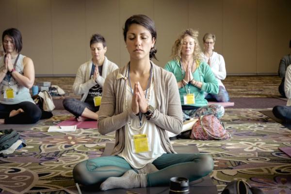 Students in lotus position